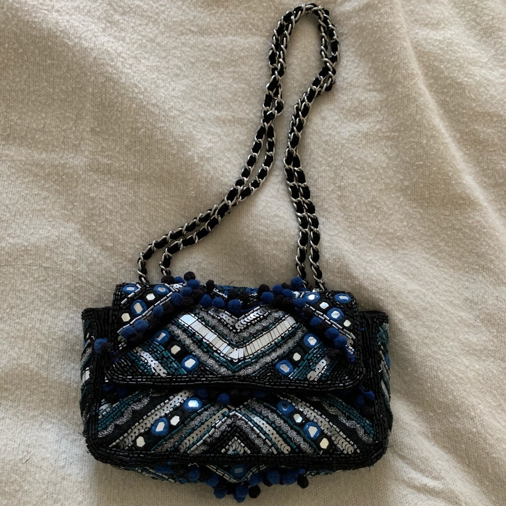 Mirror and Pom Pom Bag